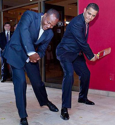 Photo: Trinidad and Tobago sport icon Brian Lara gives cricket tips to United States president and sport enthusiast Barack Obama. (Courtesy cricketrediff.com)