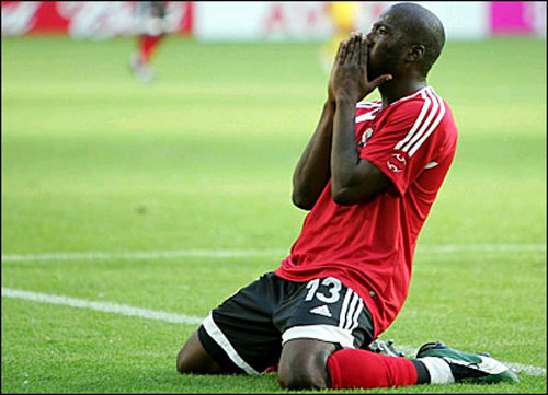 Photo: Trinidad and Tobago striker Cornell Glen collects his thoughts after striking the bar against Sweden during the Germany 2006 World Cup. (Courtesy www.bbc.co.uk)