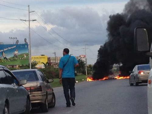 Photo: Fiery protest at Beetham Gardens. (Courtesy Anonymous Motorist)