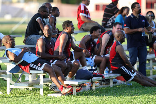 Photo: (From left to right) Calvin Pierre, Hutson Charles, Anton Corneal, Sherdon Pierre, Lasana Liburd, Terry Fenwick and Roger Ekow Watts enjoy the action from the sidelines during the inaugural Wired868 Football Festival at UWI SPEC in 2013. (Courtesy Allan V. Crane/Wired868.com)