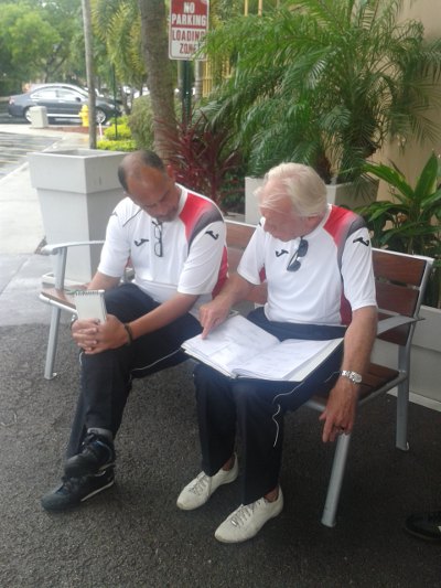 Photo: TTFA director of football Leo Beenhakker (right) makes a point to head coach Stephen Hart during a pre-2013 Gold Cup tournament camp in Fort Lauderdale. (Courtesy TTFA Media)