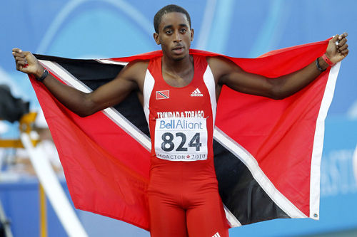 Photo: Trinidad and Tobago track star Jehue Gordon won gold at the 2013 IAAF World Championship in Moscow. (Courtesy Christianstt.com)