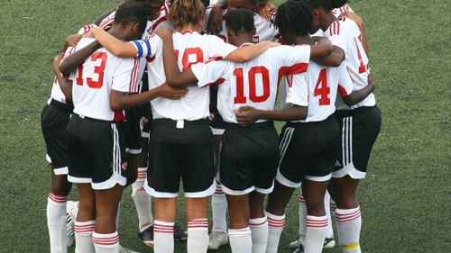 Photo: The Trinidad and Tobago national under-17 women's team shares a moment during the 2010 Under-17 World Cup. (Courtesy FIFA.com)