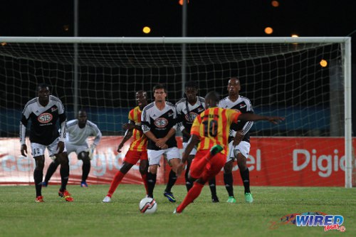 Photo: Point Fortin Civic attacker Marcus Joseph prepares to unleash a free kick against Central FC. (Courtesy Allan V Crane/Wired868)