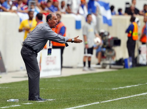 Photo: Trinidad and Tobago head coach Stephen Hart gives instructions during a 2013 CONCACAF Gold Cup fixture against El Salvador. (Copyright AFP 2014/Rich Schultz)