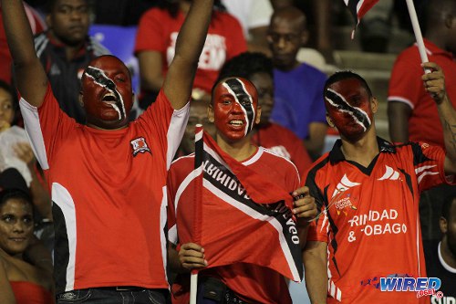 Photo: Trinidad and Tobago football supporters get behind their team during last year's international friendly against New Zealand. (Courtesy Allan V Crane/Wired868)