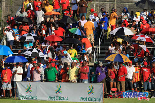 Photo: Point Fortin Civic supporters cheer on their team at the Mahaica Oval in Point Fortin during the 2014/15 season. (Courtesy Allan V Crane/Wired868)