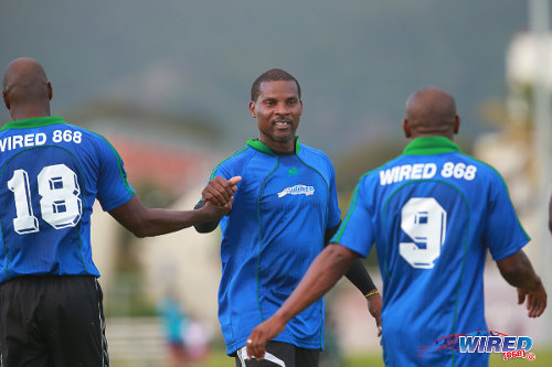 Photo: Former Trinidad and Tobago international stand-out and ex-Point Fortin Civic coach Reynold Carrington (centre) exchanges greetings with Leonson Lewis (left) and ex-W Connection teammate Earl Jean during the 2015 Wired868 Football Festival. (Courtesy Allan V Crane/Wired868)