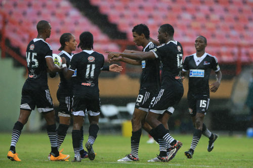 Photo: Central FC scorer Willis Plaza (third from right) and teammates congratulate Nathaniel Garcia (second from left) on his assist against Inter in the 2015 Caribbean Club Championship. (Courtesy Allan V Crane/Central FC)