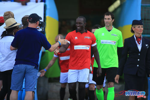 Photo: Manchester United star Dwight Yorke (centre) and goalkeeper Raymond van der Gouw prepare for action on day one of the BA Tobago Legends Football Tournament in June 2015. (Courtesy Allan V Crane/Wired868)