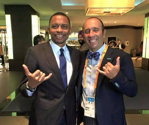 Photo: Trinidad and Tobago Olympic Committee (TTOC) president Brian Lewis (left) with a delegate at the 2015 Pan American Games in Toronto. (Courtesy TTOC)