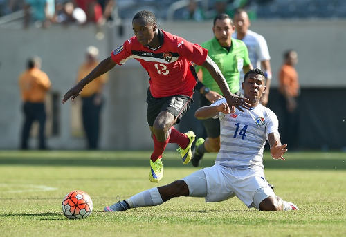 Photo: Trinidad and Tobago winger Cordell Cato (left) eludes Panama midfielder Miguel Camargo during the 2015 CONCACAF Gold Cup quarterfinal. (Copyright Jewel Samad/AFP 2015)