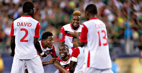 Photo: Trinidad and Tobago attacking midfielder Keron Cummings (centre) celebrates his 2015 Gold Cup goal against Mexico with teammates (from right) Cordell Cato, Joevin Jones, Mekeil Williams and Aubrey David. (Courtesy MexSport/CONCACAF)