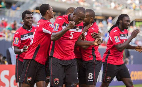 Photo: Trinidad and Tobago players celebrate after a goal in their opening 2015 CONCACAF Gold Cup match against Guatemala. (Courtesy CONCACAF)