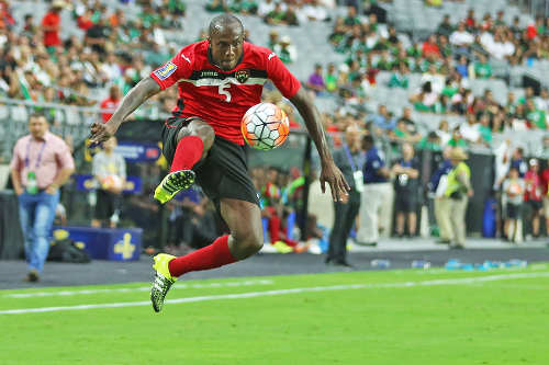 Photo: Trinidad and Tobago right back Daneil Cyrus controls the ball during 2015 CONCACAF Gold Cup action against Cuba. (Courtesy: Arianna Grainey)