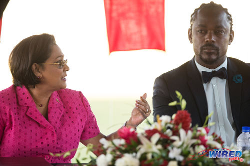 Photo: Former Prime Minister Kamla Persad-Bissessar (left) has a word with her then Sport Minister Brent Sancho during the opening of the Irwin Park Sporting Complex in Siparia on August 26. (Courtesy Allan V Crane/Wired868)