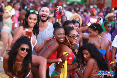 Photo: Tribe revellers let loose on Carnival Monday in 2015. (Courtesy Allan V Crane/Wired868)