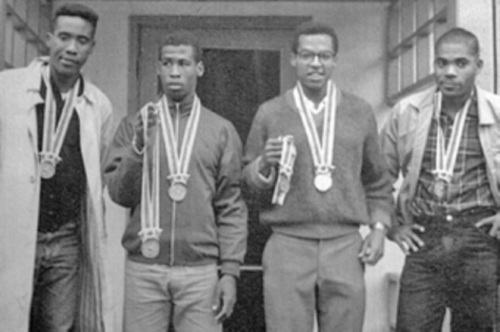 Photo: Trinidad and Tobago 4x400 metre relay team (from left) Kent Bernard, Edwin Roberts, Wendell Mottley and Edwin Skinner pose with their silver medals at the Tokyo 1964 Olympics. (Copyright Socapro)