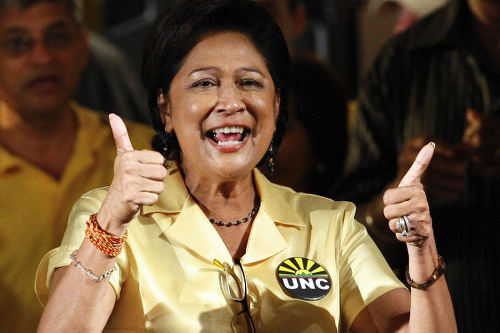 Photo: UNC political leader Kamla Persad-Bissessar celebrates victory at the 2010 General Elections. (Copyright Frederic Dubray/AFP 2015)