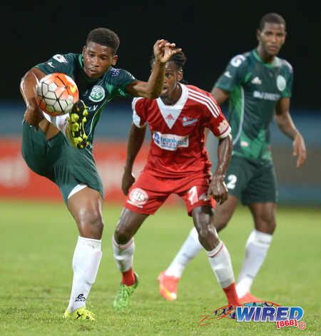 Photo: W Connection substitute Aikim Andrews (left) tries to control the ball as teammate Kurt Frederick (right) and Central FC's Jason Marcano look on during the 2015 Charity Shield. (Courtesy DPI Photography/Wired868)