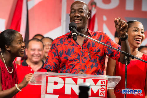 Photo: PNM political leader Dr Keith Rowley (centre) gives his victory speech at Balisier House on 7 September 2015, flanked by his wife Sharon Rowley (right) and daughter Sonel. (Courtesy Allan V Crane/Wired868)