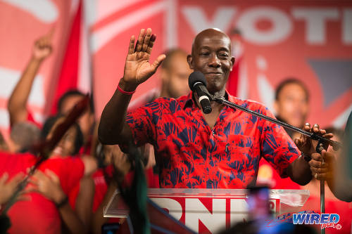 Photo: Prime Minister Dr Keith Rowley gestures to supporters at Balisier House after the election results on September 7. (Courtesy Allan V Crane/Wired868)