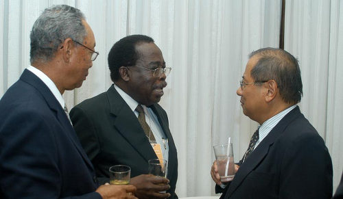 Photo: Former Petrotrin executive chairman Malcolm Jones (centre). (Courtesy Firstmagazine.com)