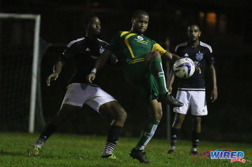 Photo: Barrackpore United attacker Conrad Smith (centre) passes the ball while Saddle Hill Hotspur players Cyrano Glen (left) and Sean Ramdoo during CNG National Super League (NSL) Championship Division action in Barrackpore. (Courtesy Chevaughn Christopher/Wired868)