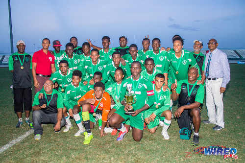 Photo: SSFL president Anthony Creed (right) poses with 2015 East Zone Intercol champions, St Augustine Secondary. (Courtesy Amigo Garraway/Wired868)