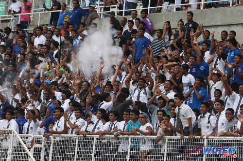 Photo: Naparima College supporters roar on their team during the 2015 South Intercol final in Marabella. (Courtesy Chevaughn Christopher/Wired868)