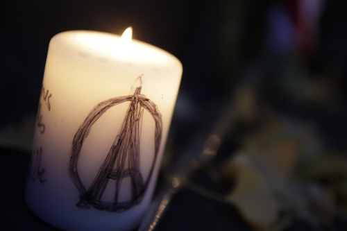 Photo: Paris was sent into shock and mourning after terrorist attacks on Friday 13 November. (Copyright AFP 2015/Kenzo Tribouilard)