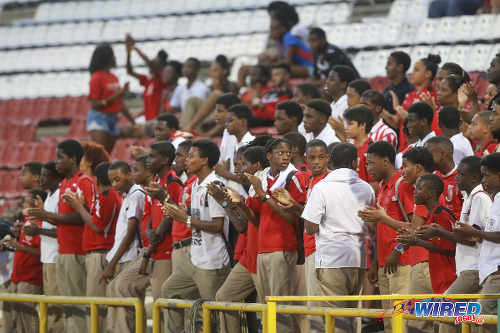 Photo: St Anthony's College students get behind their team during the 2015 North Zone Intercol final against St Mary's College at the Hasely Crawford Stadium. (Courtesy Nicholas Bhajan/Wired868)