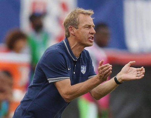 Photo: USA coach and former Germany World Cup winner Jurgen Klinsmann cheers his team on.