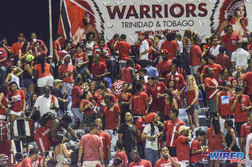 Photo: Soca Warriors supporters get ready to rumble before 2018 World Cup qualifying action against the United States. (Courtesy Allan Powder/Wired868)