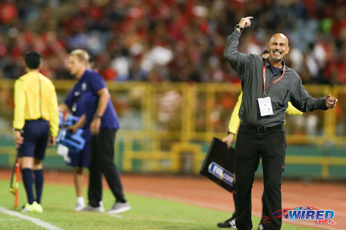 Photo: Trinidad and Tobago coach Stephen Hart (right) urges his team forward during 2018 World Cup qualifying action against the United States at the Hasely Crawford Stadium on 17 November 2015. (Courtesy Allan V Crane/Wired868)