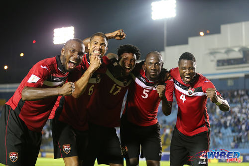 Photo: Trinidad and Tobago players (from left) Khaleem Hyland, Radanfah Abu Bakr, Mekeil Williams, Daneil Cyrus and Sheldon Bateau celebrate their 2-1 World Cup qualifying win over Guatemala on 13 November 2015. (Courtesy Allan V Crane/Wired868)