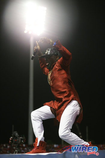 Photo: Trinidad and Tobago soca entertainer Swappi tries to rouse the ground during halftime between Trinidad and Tobago and the United States at the Hasely Crawford Stadium, Port of Spain on 17 November 2015. (Courtesy Allan V Crane/Wired868)