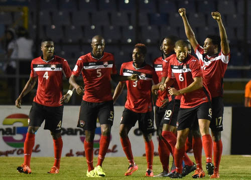 Photo: Trinidad and Tobago National Senior Team players celebrate during their Russia 2018 World Cup qualifying win over Guatemala on 13 November 2015. From left are Sheldon Bateau, Daneil Cyrus, Joevin Jones, Kevan George, Radanfah Abu Bakr and Mekeil Williams. (Copyright AFP 2015/Johan Ordonez)