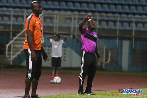 Photo: Central FC coach Dale Saunders (right) signals to his squad while San Juan Jabloteh coach Keith Jeffrey looks on during 2015/16 Pro League action at the Ato Boldon Stadium, Couva. (Courtesy Chevaughn Christopher/Wired868)