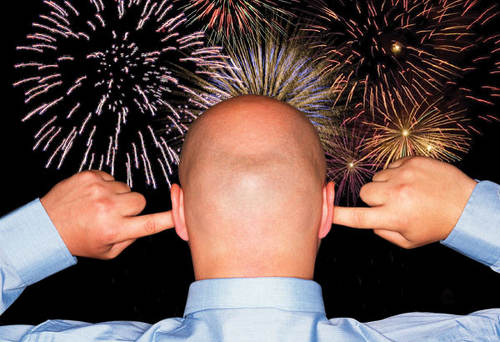 Photo: A resident enjoys a firework display.