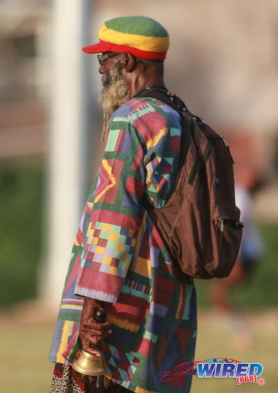 Photo: Guaya's dreadlocked supporter waits to sound his bell to signal another attack by the "Green Army" during National Super League action against Defence Force in January 2016. (Courtesy Nicholas Bhajan/Wired868)