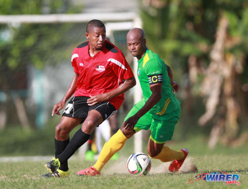 Photo: Guaya captain and playmaker Ryan Stewart (right) is watched closely by Matura ReUnited midfield ace Zavion Navarro during 2015/16 CNG NSL Premiership Division action in Matura. (Courtesy Nicholas Bhajan/WIred868)