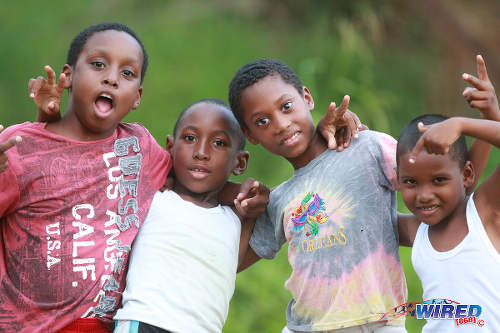 Photo: Young Matura football fans enjoy some 2015/16 CNG National Super League Premiership Division action at the Matura Recreation Ground. Matura ReUnited edged Petrotrin Palo Seco 3-2. (Courtesy Nicholas Bhajan/Wired868)