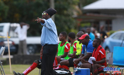 Photo: Matura ReUnited coach Devon Bobb points the way during 2015/16 CNG National Super League Premiership Division action against Petrotrin Palo Seco at the Matura Recreation Ground. (Courtesy Nicholas Bhajan/Wired868)