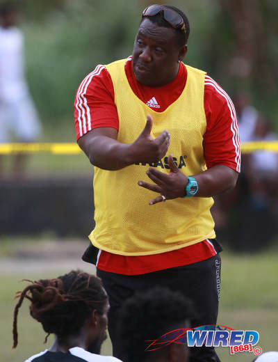 Photo: Petrotrin Palo Seco coach Dexter Cyrus makes a point during halftime in CNG National Super League Premiership Division action against Matura ReUnited at the Matura Recreation Ground on 14 January 2016. (Courtesy Nicholas Bhajan/Wired868)