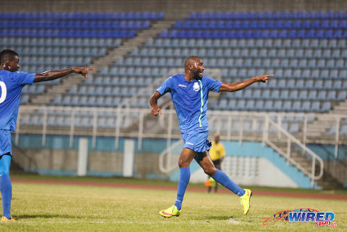 Photo: Police FC sharp shooter Makesi Lewis (right) celebrates after his strike against San Juan Jabloteh on 22 January 2016. Looking on is his teammate Kareem Freitas. (Courtesy Chevaughn Christopher/Wired868)