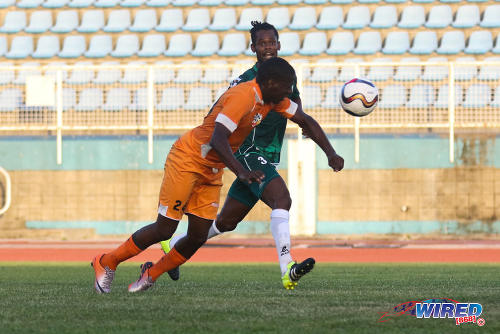 Photo: Club Sando striker Devon Modeste heads home the game winner while W Connection player Gerard Williams (background) looks on during 2015/16 Pro League action. (Courtesy Chevaughn Christopher/Wired868)