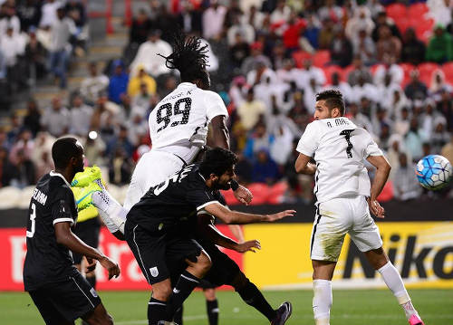 Photo: Al Jazira and Trinidad and Tobago forward Kenwyne Jones (centre) heads home during an AFC Champions League play off contest against Al Saad on 9 February 2016. (Courtesy KJ Media)