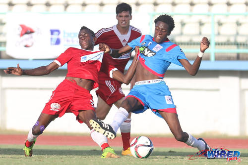 Photo: Central FC attacker Kadeem Corbin (left) and St Ann's Rangers defender Shaquille Moses (right) tussle for the ball while Central midfielder Sean De Silva looks on during TT Pro League action. (Courtesy Chevaughn Christopher/Wired868)