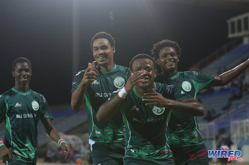 Photo: W Connection players (from right) Triston Hodge, Jomal Williams, Alvin Jones and Dimitrie Apai celebrate during 2016 Caribbean Club Championship action against Club Sportif Moulien in Couva on 26 February 2016. (Courtesy Chevaughn Christopher/Wired868)